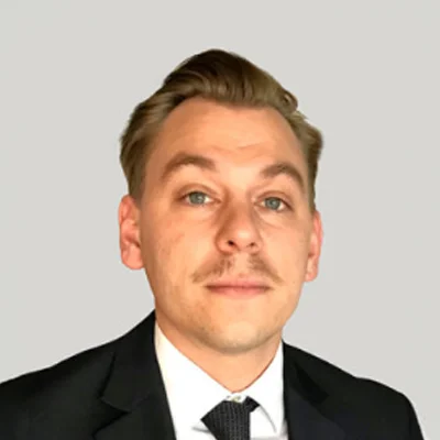 A headshot photo of dentist Andrew Kiss