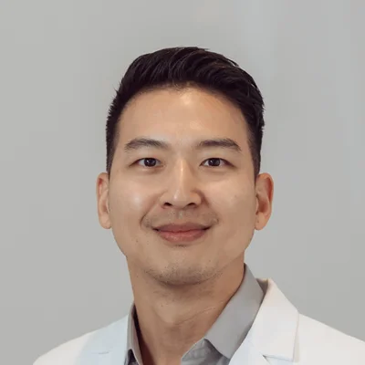 A headshot photo of orthodontist Peter Lee
